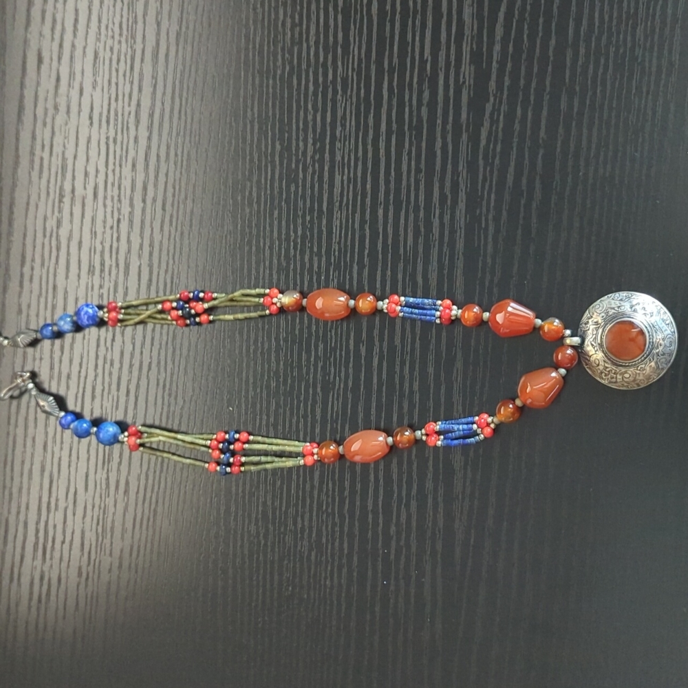 Amber like beaded necklace with pendant